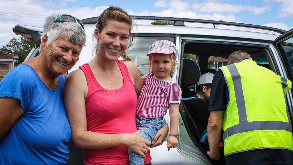Carla Henco (grandmother), Emily Henco (mum) with daughter Lucy and son Lennox with a Roadwise officer. Photo: Supplied