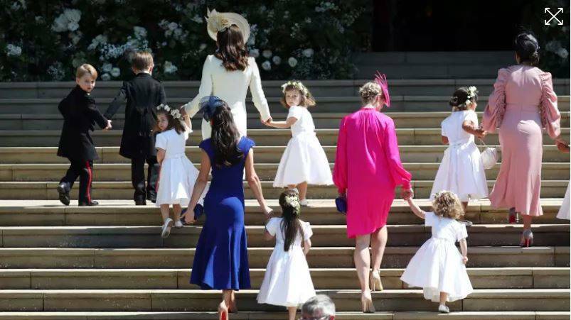  Prince George, left, Princess Charlotte, third left, Kate, the Duchess of Cambridge, background fourth left and Jessica Mulroney foreground arrive with the bridesmaids and page boys. Photo: AP


