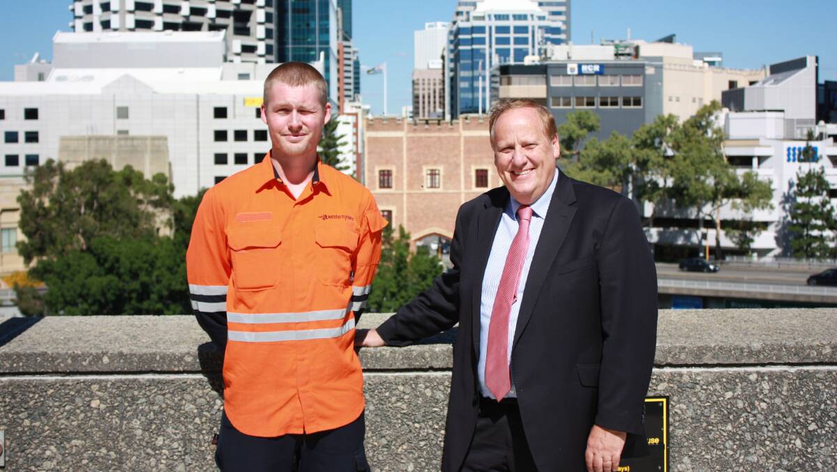 New Western Power apprentice Liam Cook and Bunbury MLA Don Punch celebrate the success of South Regional TAFE's programs. Photo: Supplied.   