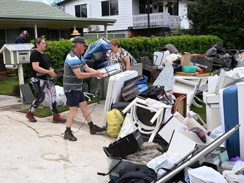 Queensland's recovery focus has switched to the southeast where hundreds of homes were inundated. (Darren England/AAP PHOTOS)