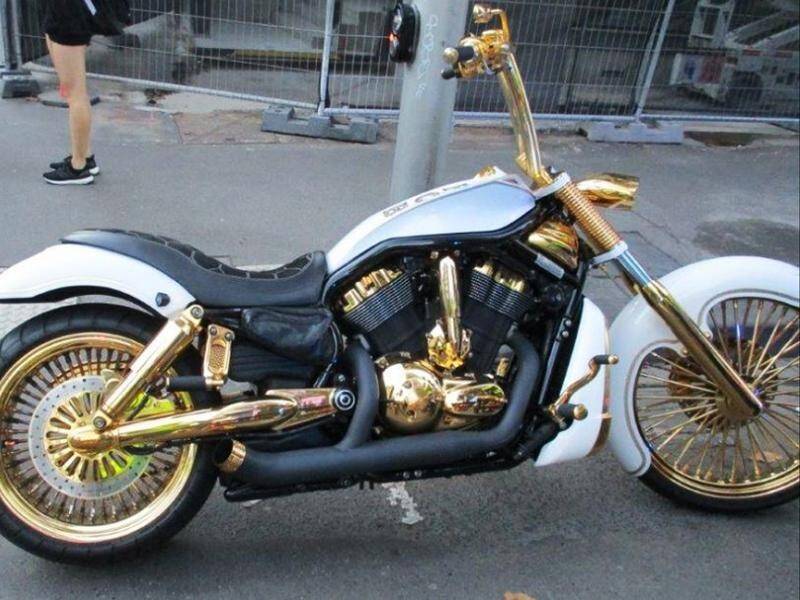 The rider of a gilded motorcycle has attracted the unwanted attention of police in Melbourne.
