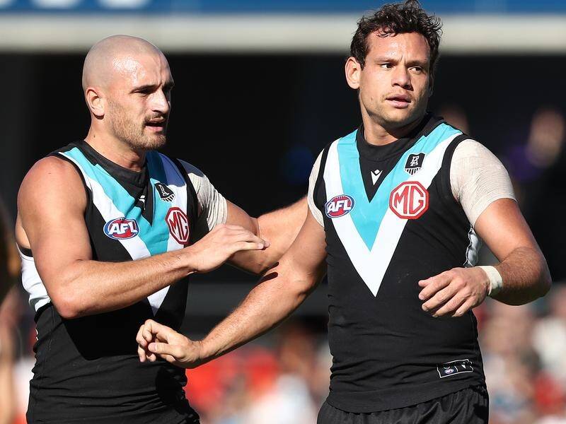Steven Motlop (r) kicked two goals in Port Adelaide's comfortable 50-point AFL win over Gold Coast.