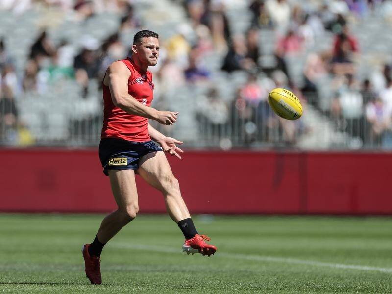 Key Melbourne defender Steven May trained freely for the Demons on the eve of the grand final.