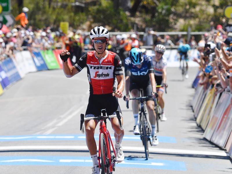 Daryl Impey has won the Tour Down Under again despite Richie Porte (pic) taking the final stage.