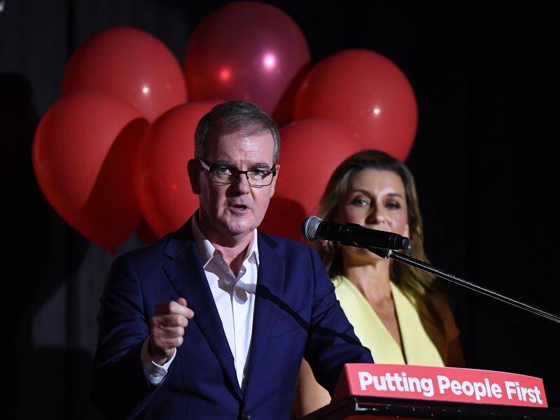 NSW Labor leader Michael Daley, with wife Christina, has conceded defeat in the state election.