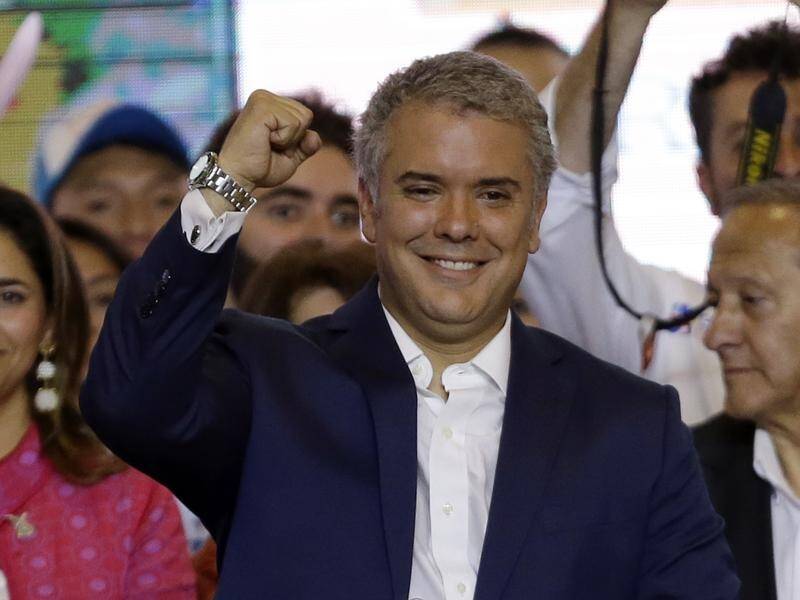 Colombia's President Elect Ivan Duque celebrates his victory in the presidential runoff election.