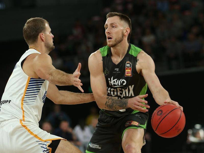 Mitch Creek (right) impressed with new club Phoenix in the NBL.
