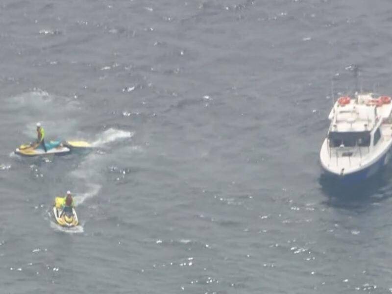 Rescue crews scoured Port Phillip Bay for any sign of a pilot and TV camera operator. (HANDOUT/CHANNEL NINE)