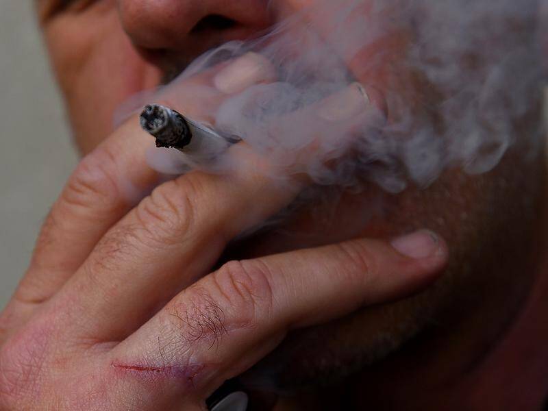 Queensland health authorities have welcomed the passage of reforms to tobacco sales and smoking. (Sam Mooy/AAP PHOTOS)