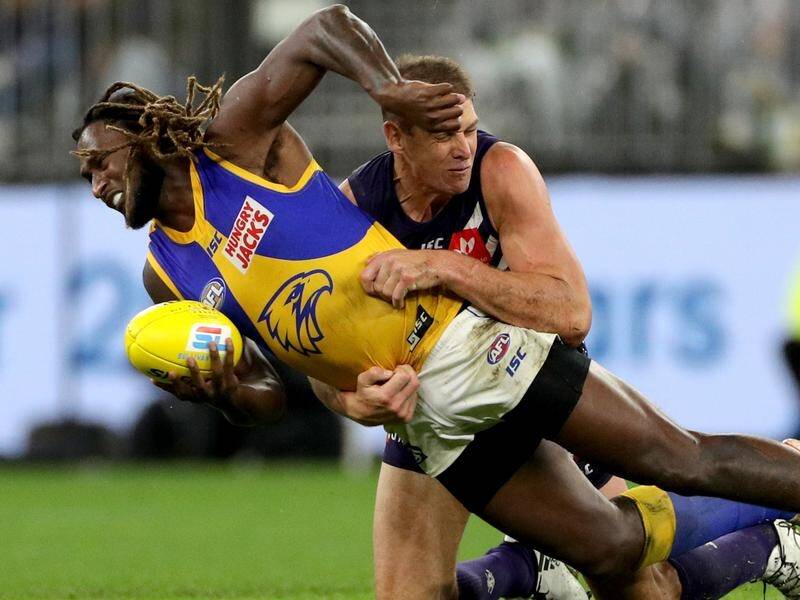 Eagle Nic Naitanui's super AFL form after a second knee operation is inspiring, says Ron Barrass.
