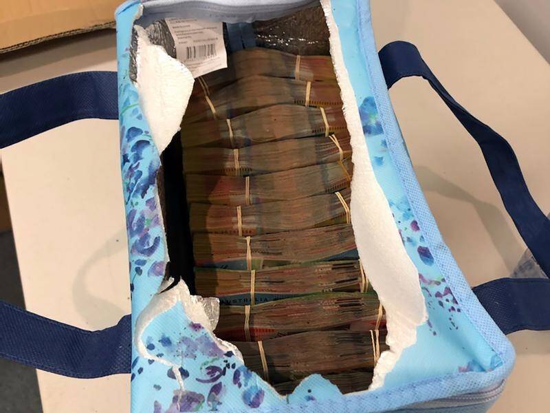 Federal police have seized $1 million in cash as part of a money laundering investigation.