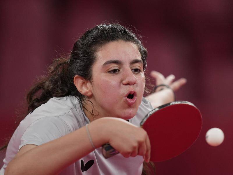 The youngest competitor at the Olympics, Syria's 12-year-old Hend Zaza is out of the table tennis.