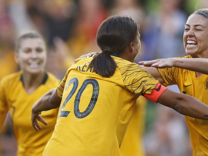 Matildas Sam Kerr (20) and Alanna Kennedy (r) will face each other in the Women's FA Cup final.