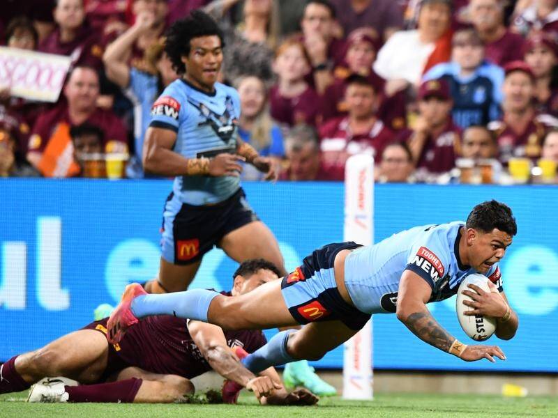 Latrell Mitchell was one of the outstanding Blues in their 50-6 annihilation of Queensland.