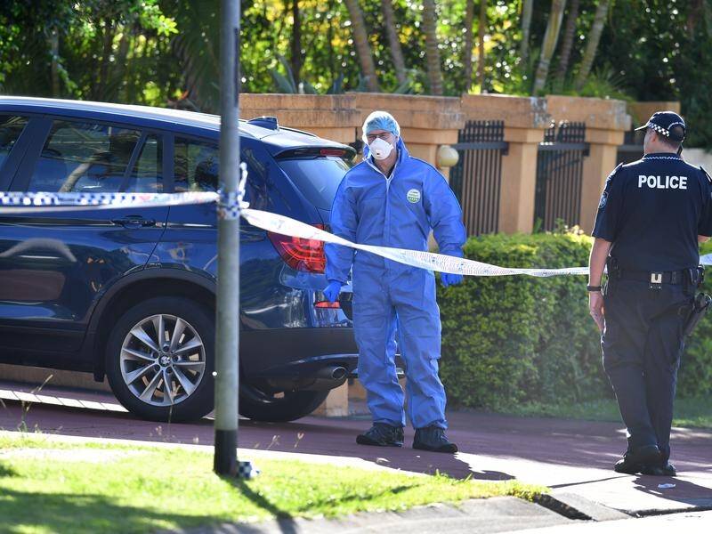 A killer is on the run after gunning down a doctor at his Brisbane home.
