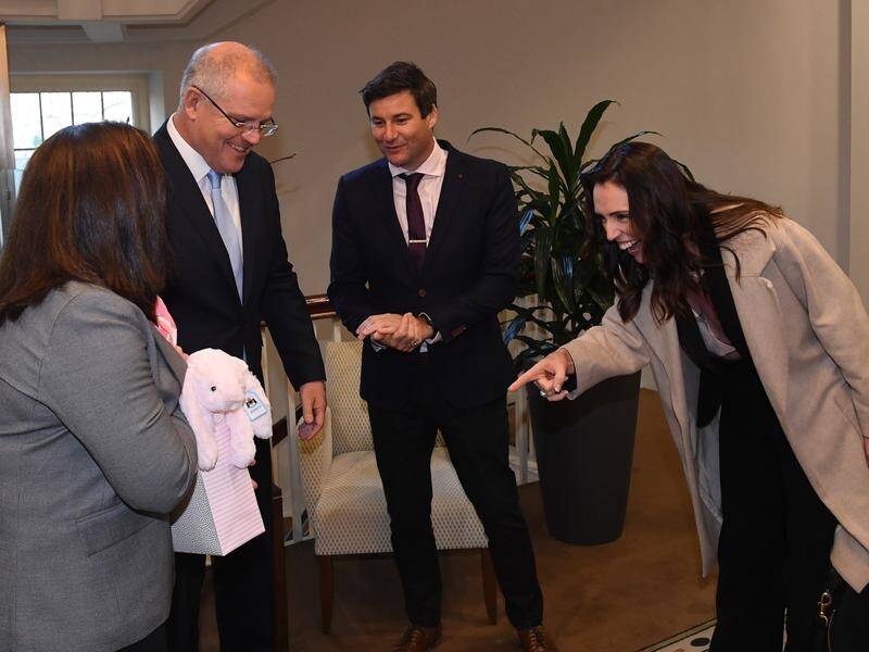 NZ Prime Minister Jacinda Ardern(R) is meeting PM Scott Morrison (second left) in Melbourne.