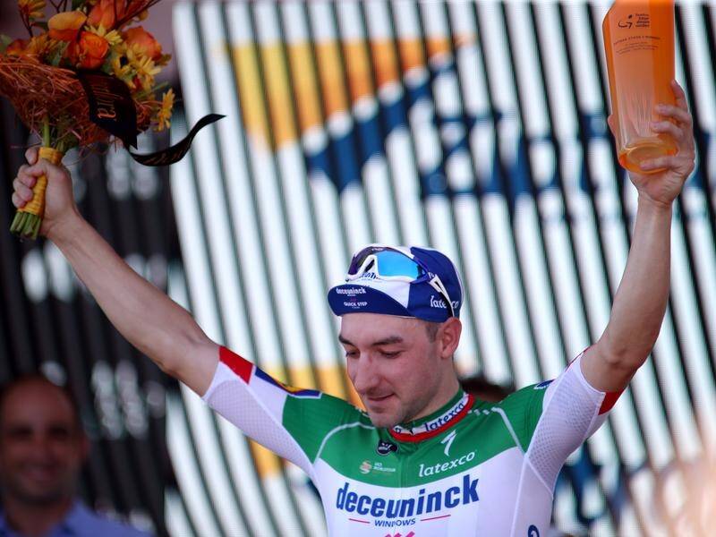 Italys Elia Viviani has won the opening stage of cycling's Tour Down Under in hot conditions.