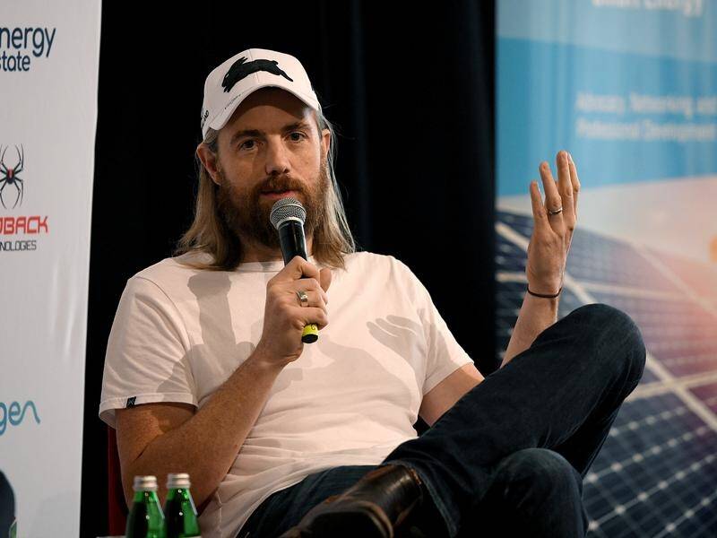 Atlassian's Mike Cannon-Brookes is funding an energy collective to install solar and battery setups.