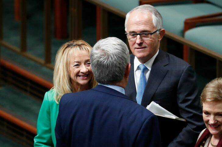 Ken Wyatt speaks with Chief Government Whip Nola Marino and Prime Minister Malcolm Turnbull at the start of Question Time on Tuesday 30 May 2017. fedpol Photo: Alex Ellinghausen