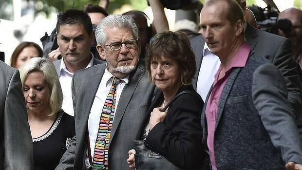 Rolf Harris arrives for sentencing with his daughter Bindi (left) and niece Jenny. Photo: Reuters.