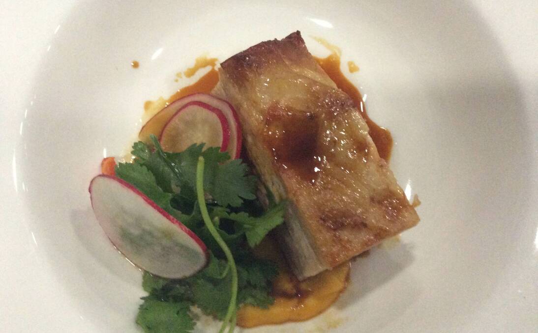 The masterstock braised pork belly entree at the Hayward Medal count.