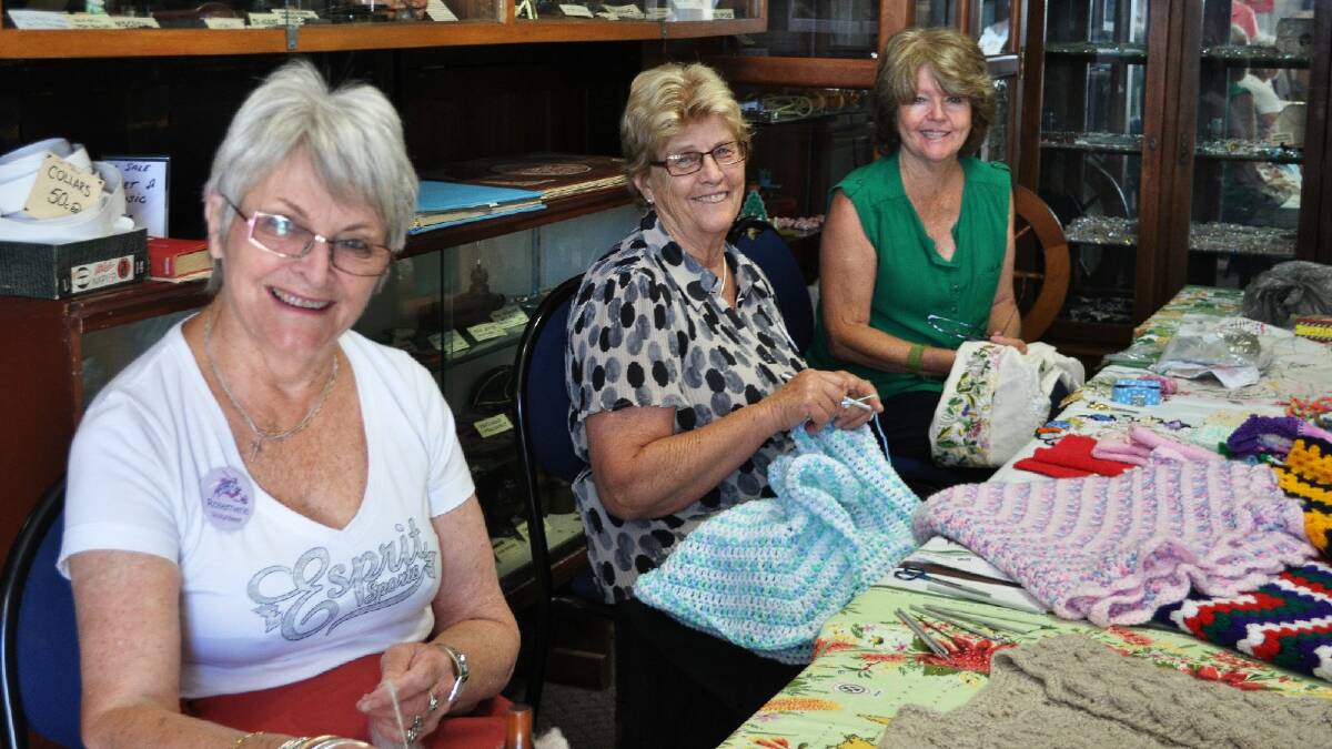 Rosemarie Gregorie, Sheila Mockton and Penny Swingle were welcoming and knitting at the door for the Busselton Museum's second restoration open day on Wednesday. Photo: Jade Jurewicz/Busselton-Dunsborough Mail.