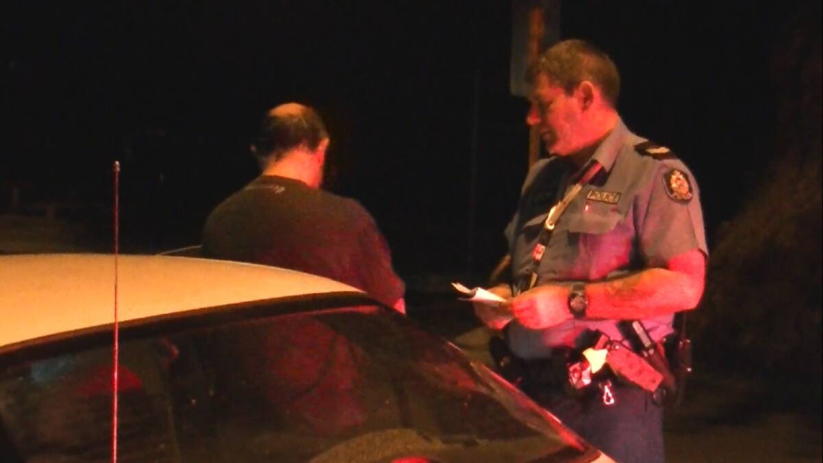 Senior Constable Lance Beynon talking to a driver whose licence had been expired for nearly four months.