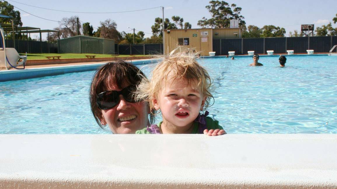 Mikaela, 16 months, cools off in the shallow end of Merredin's big pool with her nanna Debbie Kubiak on Saturday. Photo: Mal Gill/Merredin-Wheatbelt Mercury.
