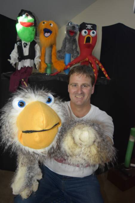 Glen Perks with his puppets. 