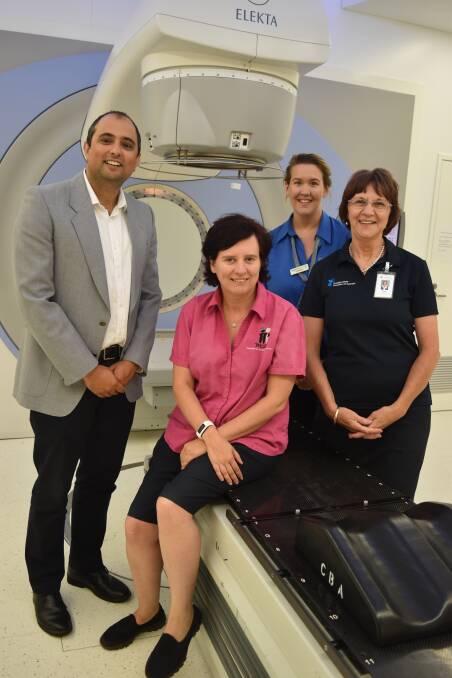 Radiation Oncology Centre Bunbury Dr Siddhartha Baxi, with McGrath Breast Cancer nurse Ann Retzlaff, centre staff Aleisha Bray and Kaye Pedretti standing in the radiation treatment facility. 