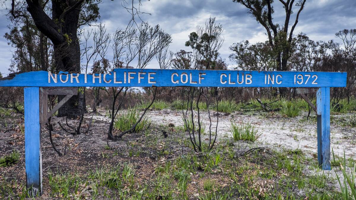 The sign for the Northcliffe Golf Club was burnt but not beaten during February's large bushfire. Photo: Ashley Pearce. 