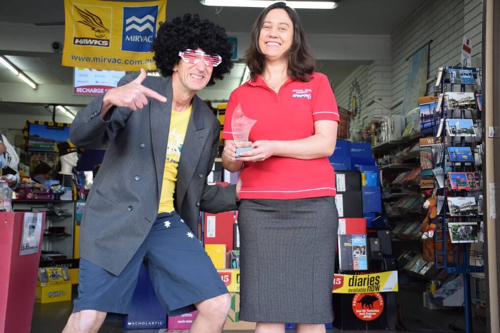 Central News Bunbury owner Ian Cross, pictured channelling pop star Redfoo, and his wife and co-owner Suzanne are celebrating a Newsagent of the Year award for the second year in a row.