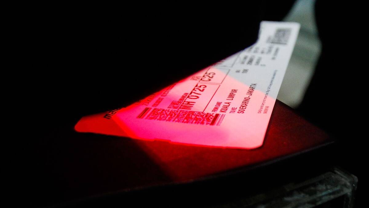 A passenger's ticket at the departure gate in Kuala Lumpur International Airport on March 20