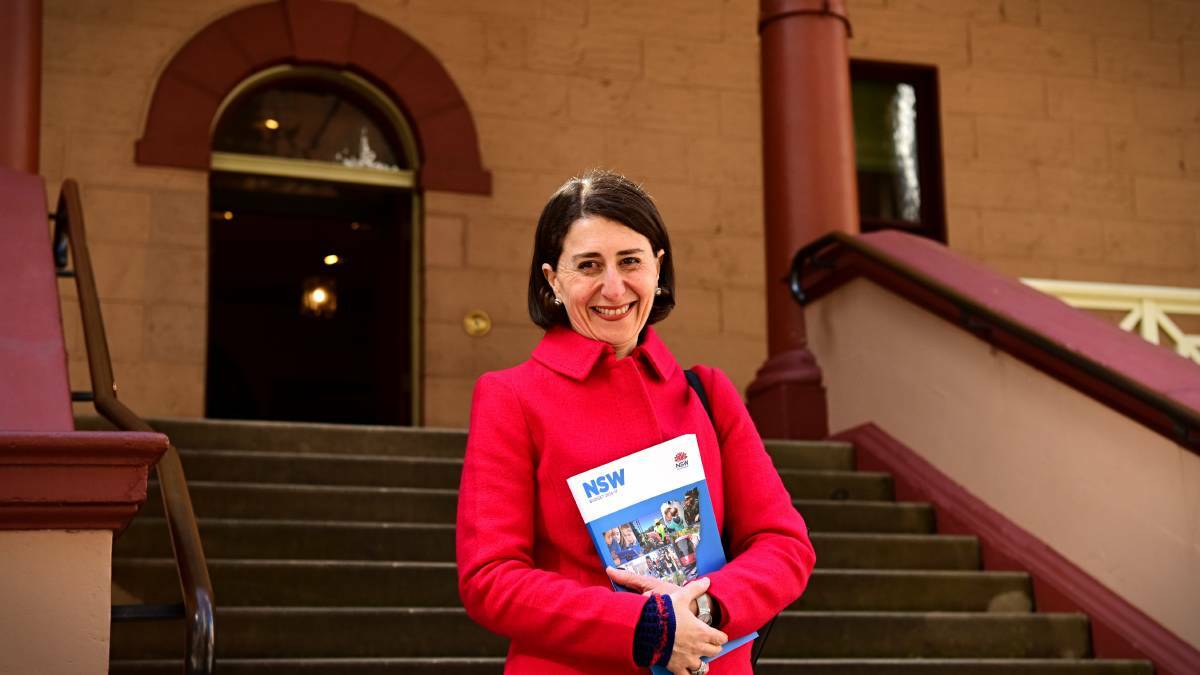 NSW State Treasurer Gladys Berejiklian poses with the 2016/17 budget papers outside State Parliament House. Picture: Wolter Peeters