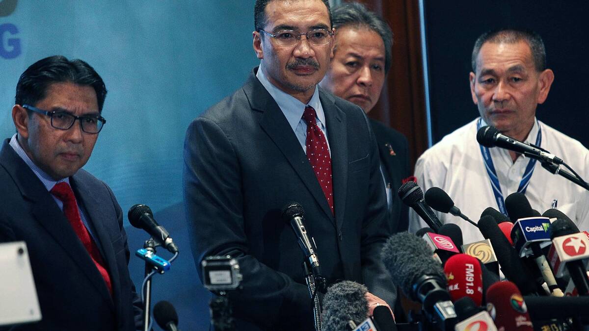 Malaysia's Minister of Defence and Acting Transport Minister Hishammuddin Hussein (2R) listens to questions from the floor during a press conference on March 20. PIc: Getty Images