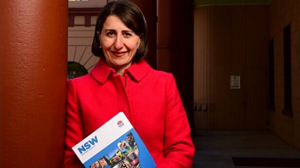 State Treasurer Gladys Berejiklian with the 2016-17 budget papers outside State Parliament on Monday. Photo: Wolter Peeters

