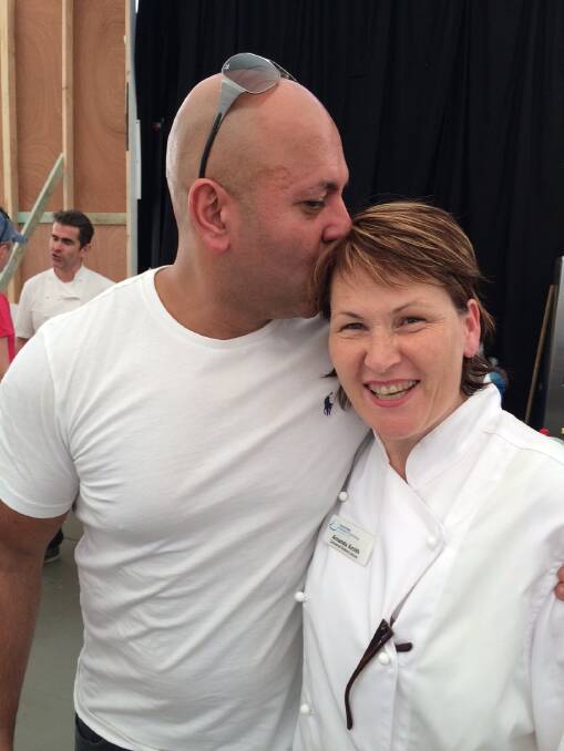 UK Michelin chef Sat Bains sealed Ms Smith's good work with a kiss.
