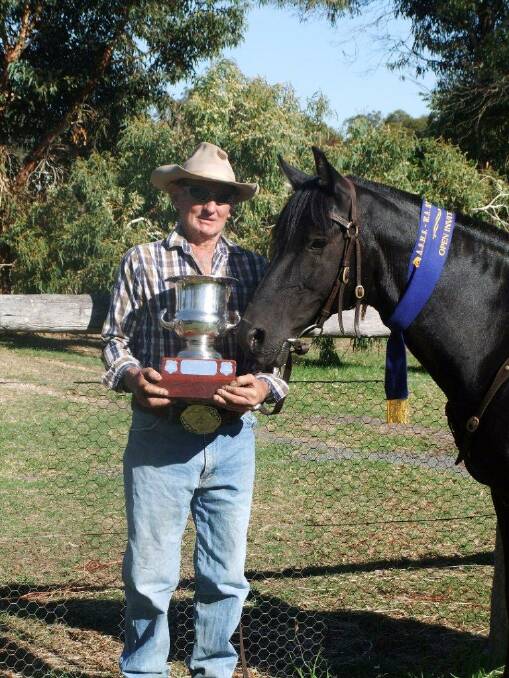 Henry Clifton with Foxy and his trophy.  