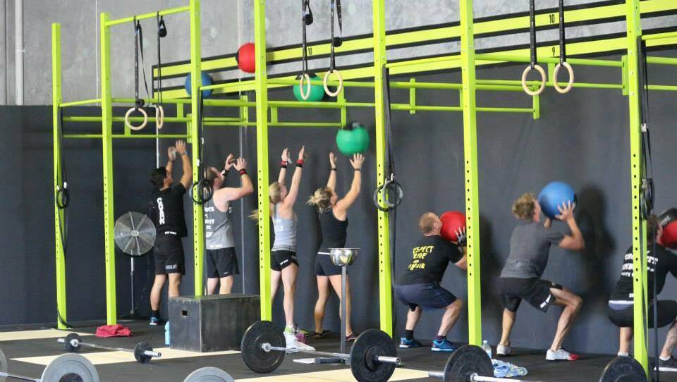 CrossFit workouts are extremely varied and can include "wall balls" (pictured). 