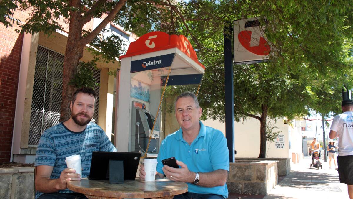 Cafe 140 owner Alex Garbelini and Telstra area general manager Boyd Brown could soon enjoy a coffee in Victoria Street while using free wifi on their mobile devices. 