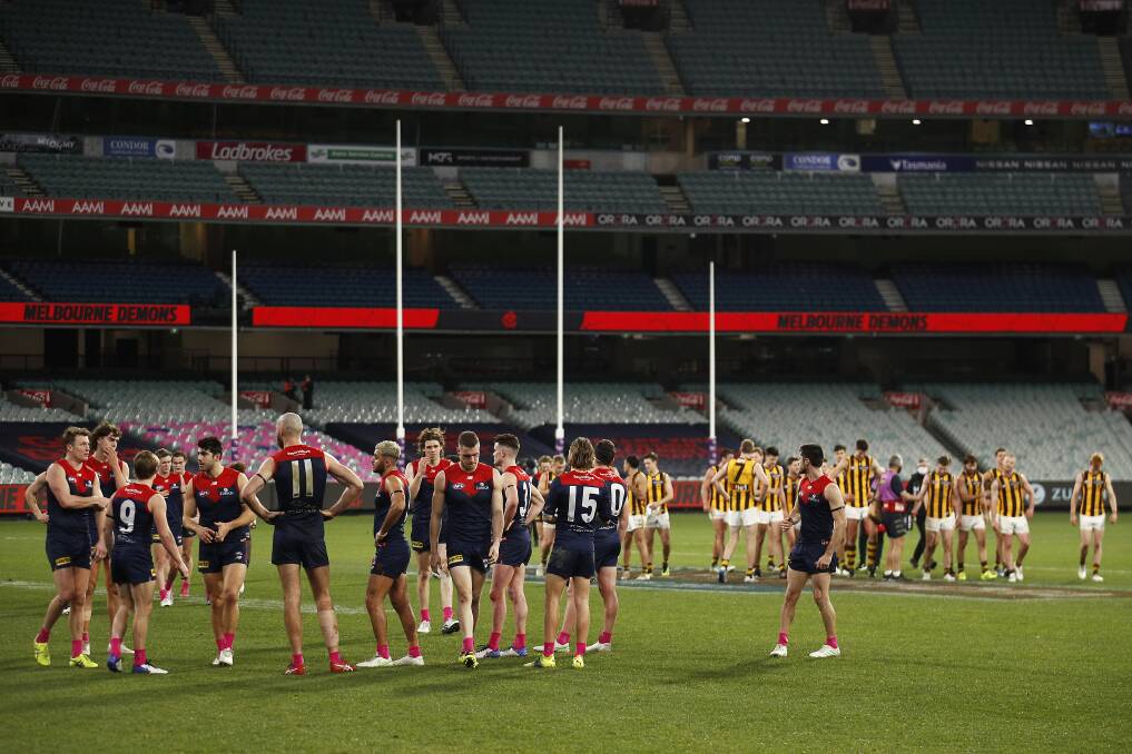 DEBATE: The season's second draw between Melbourne and Hawthorn reignited debate about whether extra time should be played. Photo: Daniel Pockett/AFL Photos/via Getty Images