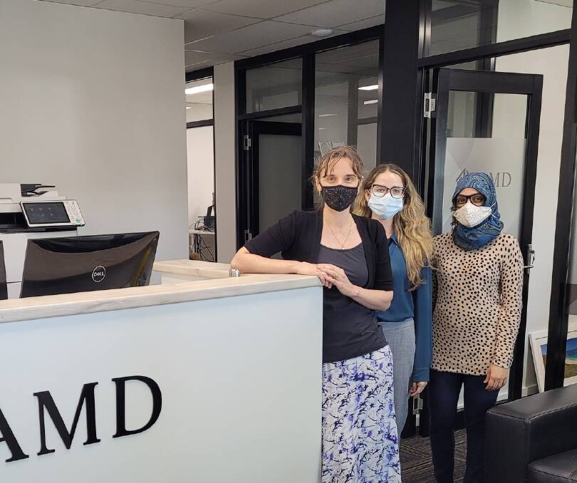 AMD Lorex director and Margaret River mum Miriam Bailey (front, with colleagues) said the virus hit her family hard, in more ways than one. Picture: Facebook/AMD