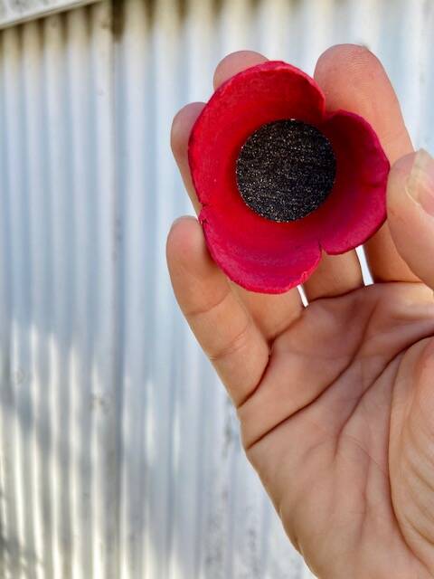 An Anzac Day poppy created from egg cartons, just one of the eco-friendly ideas from the creator of Postbox Poppies.