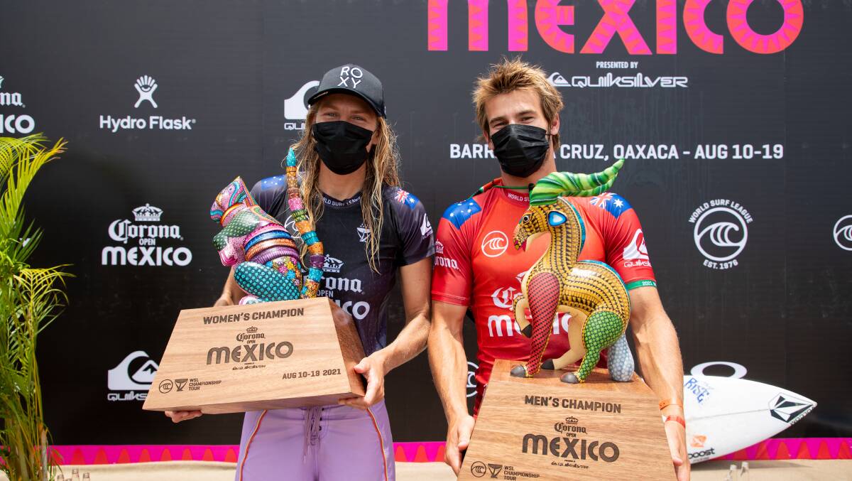 Australians Stephanie Gilmore and Jack Robinson with their Corona Open Mexico trophies. Photo: WSL/Heff