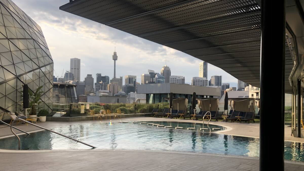 The Sydney skyline from the pool at The Star Grand. Picture by Kellie Waring