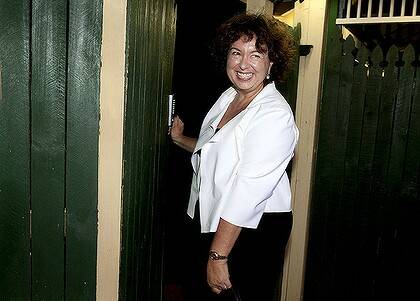 Therese Rein returns home to her Norman Park residence following her husband Kevin Rudd's resignation announcement last night.