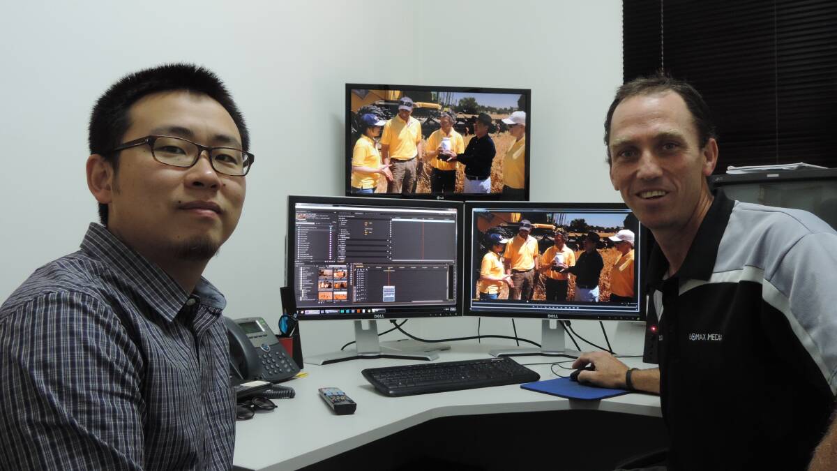 Bunbury-Jiaxing Business Office liaison officer Edwin Zhuang and Lomax Media owner Dean Lomax.