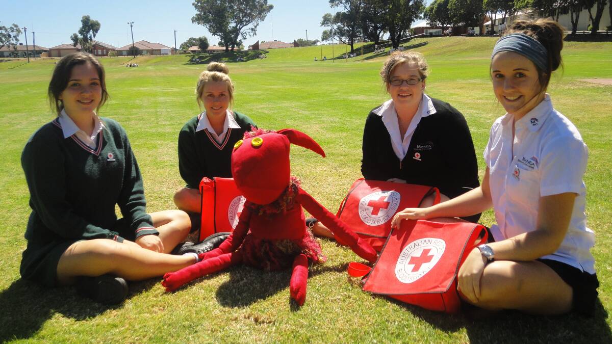 Students from Bunbury Catholic College and Manea Senior College participated in the Australian Red Cross Blood Service youth ambassador program. Pictured is Carla Manning, Caitlin Blunden, Carina Needham, Sarah Gawley and in the middle a haemoglobin bear.