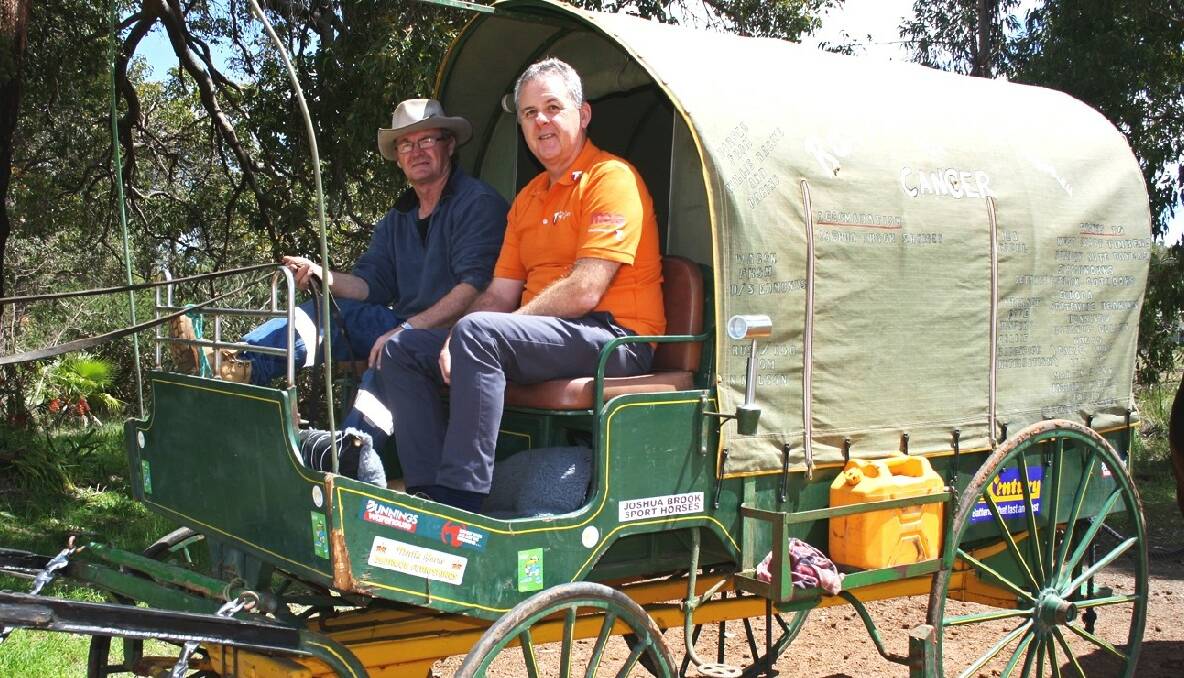 Ian ‘Rattles’ Retallack will have communications wherever he goes on his three year adventure after a donation from Telstra South West general manager Boyd Brown. Photo: Bunbury Mail.